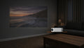 Horizon in profile, lens aimed at a 16:9 picture on the far wall. Dark living room. Standard throw.