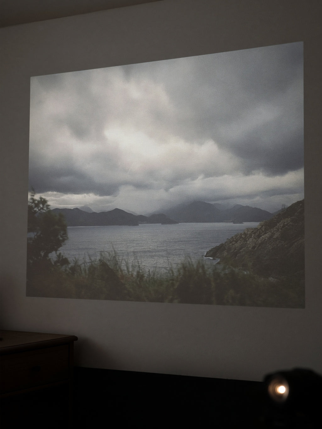 Close view of a 1080p picture on the wall. Dark or dim rooms.